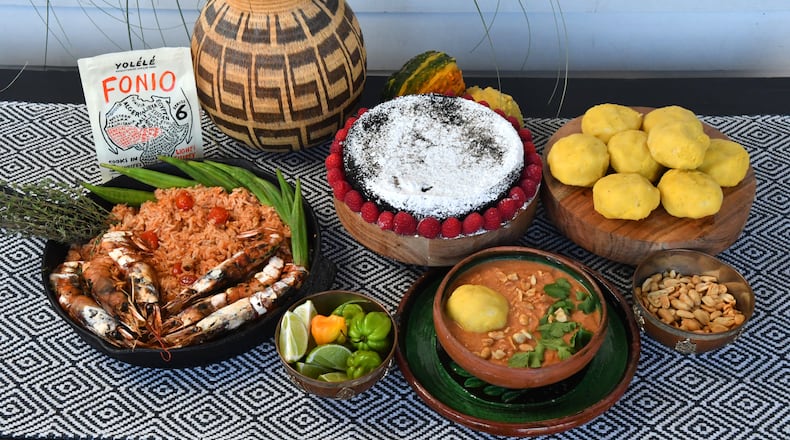 You can prepare West African cuisine at home with dishes such as Jollof Rice with Roasted Shrimp and Okra (left in skillet), Fonio Chocolate Cake with Raspberries (center top) and Peanut Soup with fufu (right), which are fonio and cassava dumplings. (Styling by Lisa Hanson / Chris Hunt for the AJC)