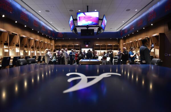 Braves vice chairman John Schuerholz speaks to members of the press in the team's clubhouse in 2020. (Hyosub Shin/AJC)