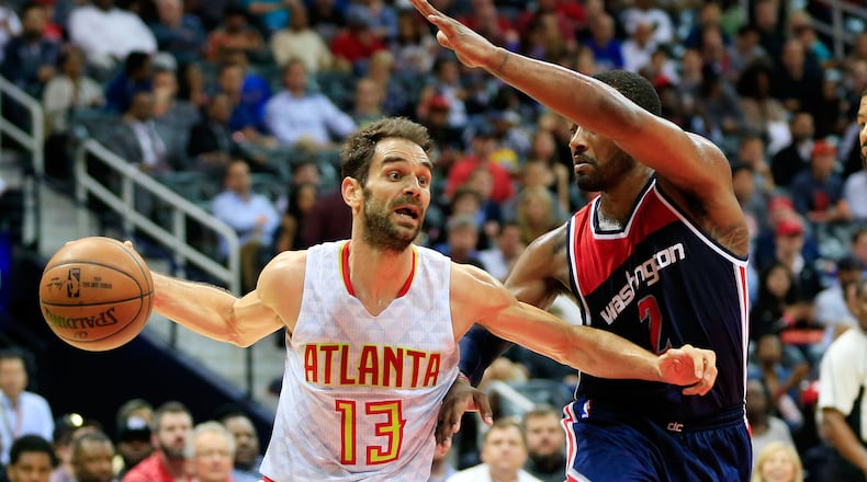 Jose Calderon of the Atlanta Hawks drives to the basket past John Wall of the Washington Wizards along the baseline during the second quarter against the Washington Wizards in Game 4 of the Eastern Conference Quarterfinals during the 2017 NBA Playoffs at Philips Arena on April 24, 2017 in Atlanta, Georgia. (Photo by Daniel Shirey/Getty Images)