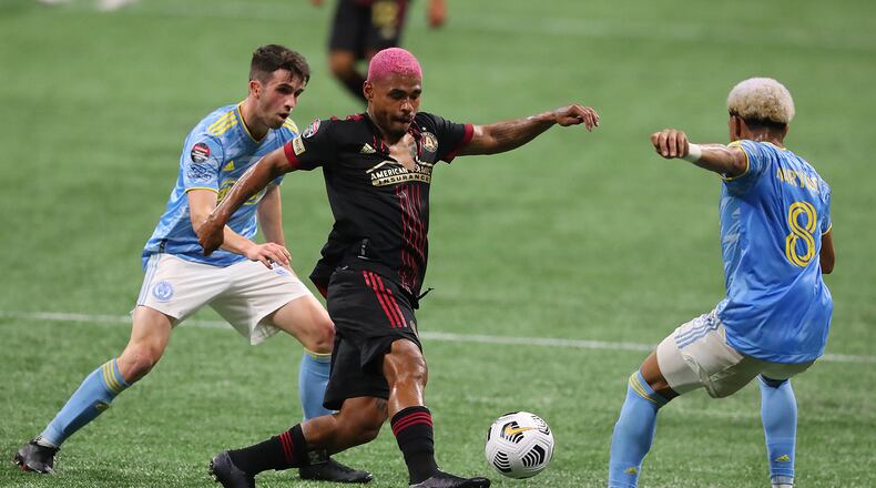 Atlanta United forward Josef Martinez works against Philadelphia Union defenders in a CONCACAF Champions League quarterfinal match on Tuesday, April 27, 2021, in Atlanta. Philadelphia won 3-0. (Curtis Compton / Curtis.Compton@ajc.com)
