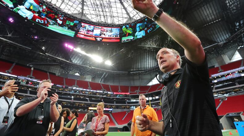 A lot of people figure to point at Mercedes-Benz Stadium’s video board, as Atlanta United president Darren Eales may be be doing here.