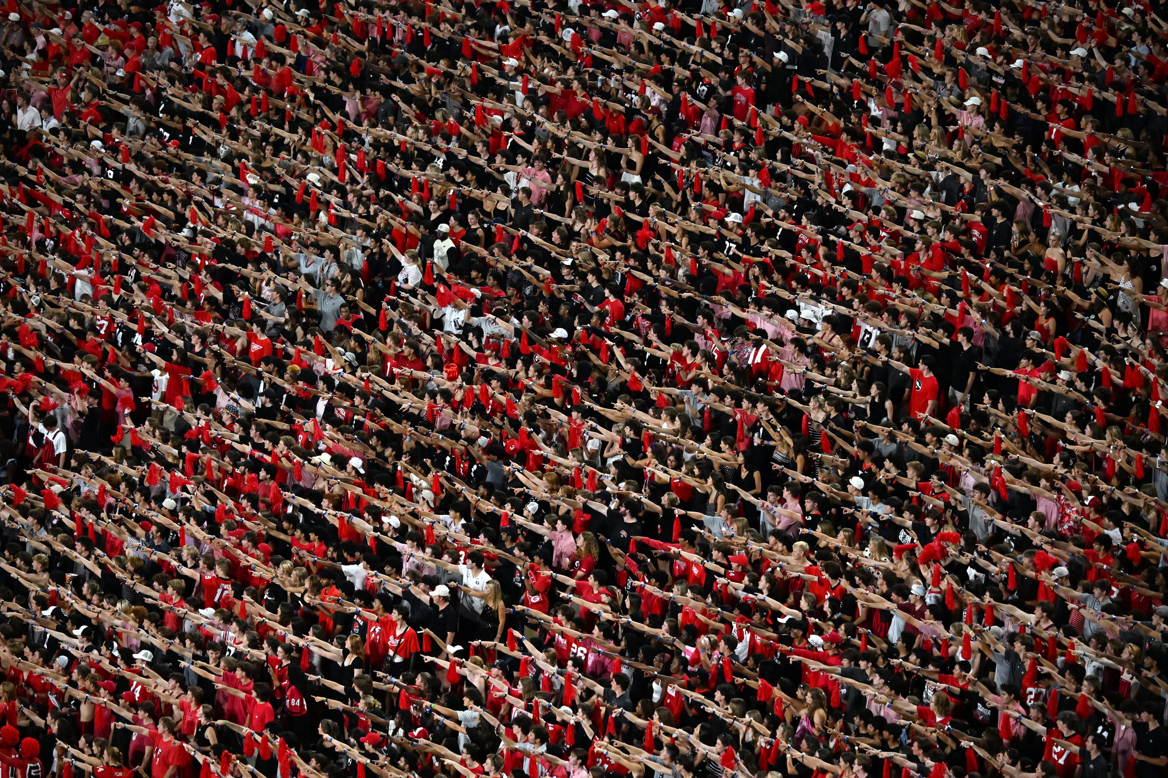 Football fans cheer before Georgia game against Alabama at Sanford Stadium, Saturday, September 27, 2025, in Athens. (Hyosub Shin / AJC)