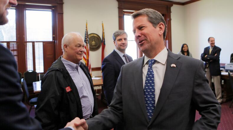 3/7/18 - Atlanta - Secretary of State Brian Kemp, greets supporters as he qualified to run for governor.  Qualifying for Georgia's 2018  elections began Monday and runs through Friday.  Georgia has races for Governor, Lieutenant Governor and other statewide posts, and every congressional seat nationwide is up for a vote in November.  BOB ANDRES  /BANDRES@AJC.COM