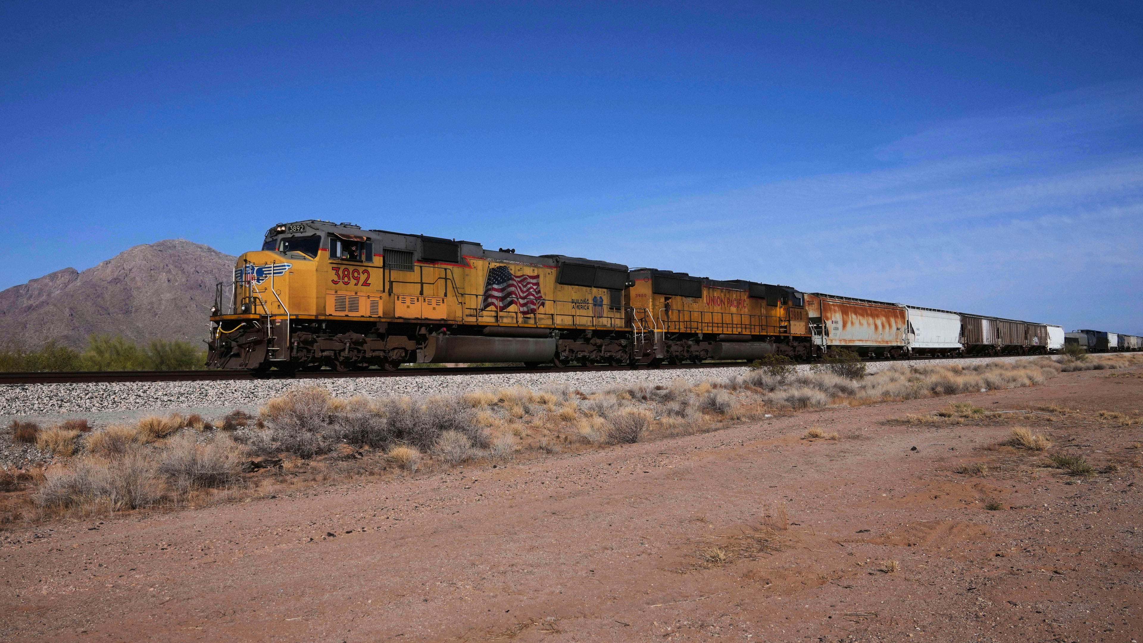 FILE - A Union Pacific freight train travels along the tracks April 17, 2025, in Eloy, Ariz. (AP Photo/Ross D. Franklin, File)
