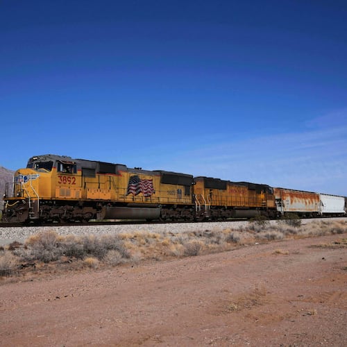 FILE - A Union Pacific freight train travels along the tracks April 17, 2025, in Eloy, Ariz. (AP Photo/Ross D. Franklin, File)