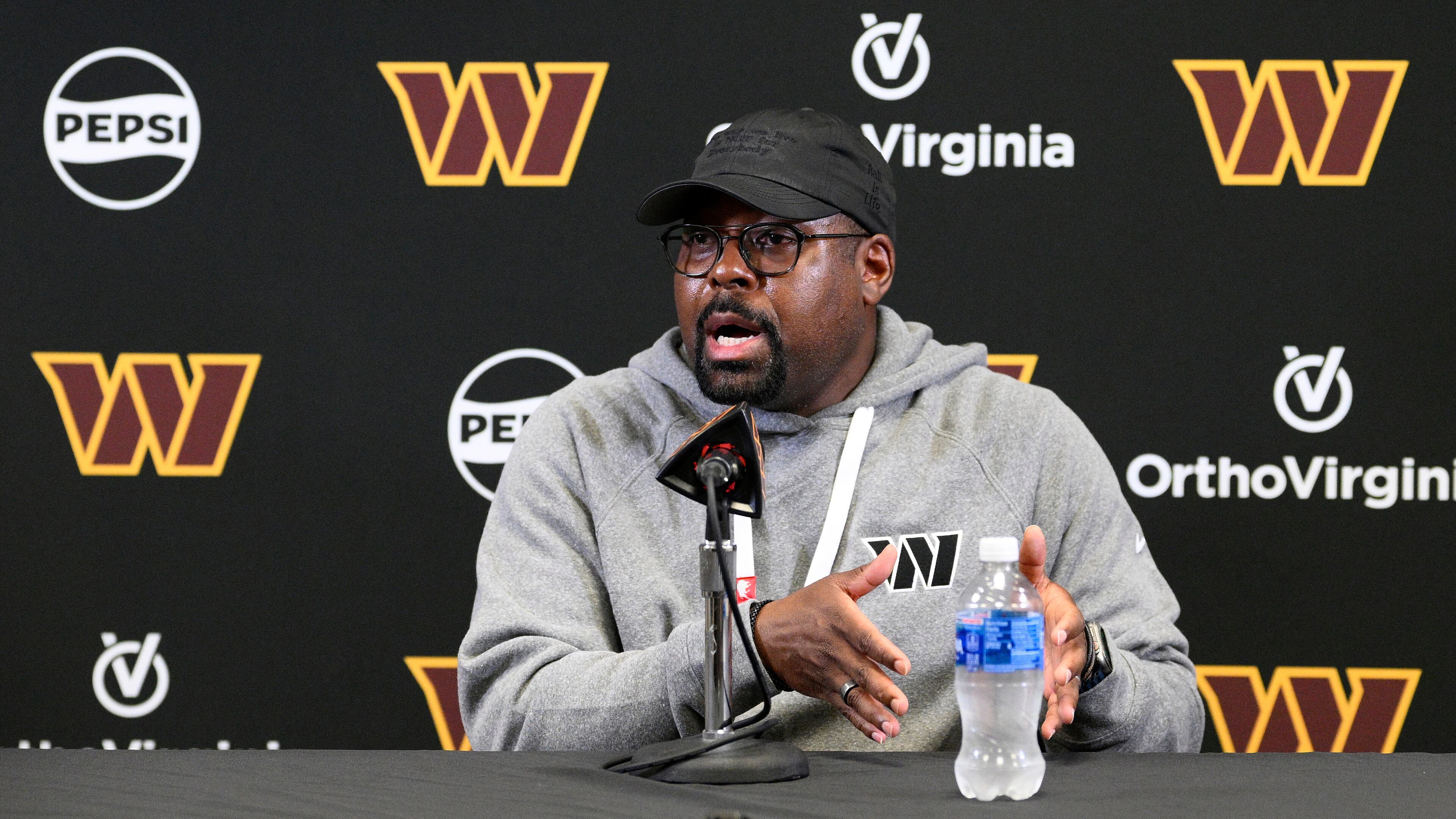 File - Washington Commanders defensive coordinator Joe Whitt Jr. talks to the media before NFL football practice June 4, 2025, in Ashburn, Va. (AP Photo/Nick Wass, File)