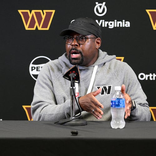 File - Washington Commanders defensive coordinator Joe Whitt Jr. talks to the media before NFL football practice June 4, 2025, in Ashburn, Va. (AP Photo/Nick Wass, File)
