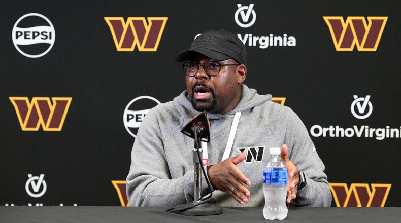 File - Washington Commanders defensive coordinator Joe Whitt Jr. talks to the media before NFL football practice June 4, 2025, in Ashburn, Va. (AP Photo/Nick Wass, File)