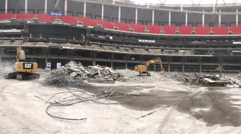The latest step in Georgia Dome deconstruction: taking out the lower seating bowl.
