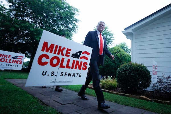 U.S. Rep. Mike Collins greets supporters during his June runoff election watch party in Jackson. (Miguel Martinez/AJC)