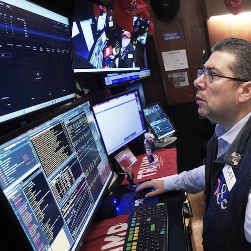 Trader Michael Capolino works on the floor of the New York Stock Exchange, Monday, Nov. 24, 2025. (AP Photo/Richard Drew)