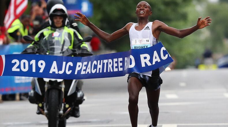 Rhonex Kipruto wins the 50th AJC Peachtree Road Race with an unofficial record time of 27:01 on Thursday, July 4, 2019, in Atlanta. Curtis Compton/ccompton@ajc.com