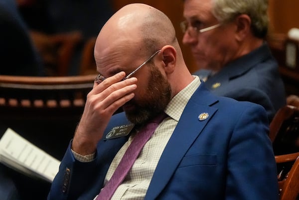 State Sen. Josh McLaurin looks at material during a session on the Senate floor, Thursday, March 6, 2025, in Atlanta. (AP Photo/Mike Stewart)