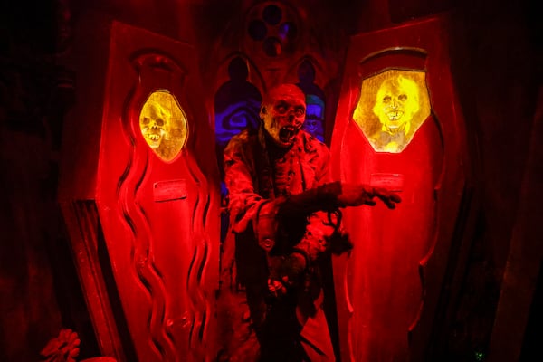 Inside the Netherworld’s impressive 70,000-square-foot warehouse, visitors can explore hundreds of animatronics, special effects and props, along with 100 to 125 live scare actors across multiple attractions. The popular haunted house is set to kick off its 30th season on Thursday, Sept. 10, 2026. (Miguel Martinez/AJC)