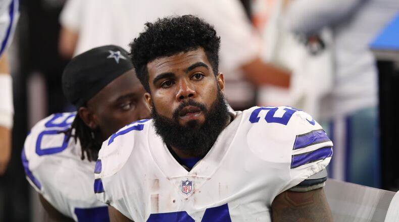 Dallas Cowboys running back Ezekiel Elliott (21) on the bench during the second half against the Oakland Raiders at AT&T Stadium.