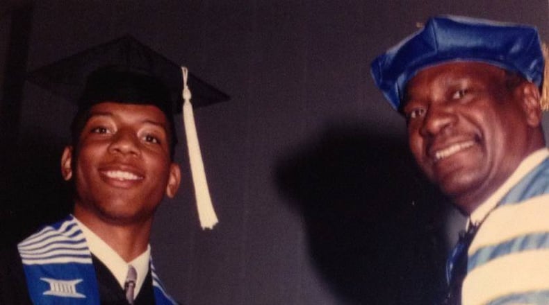 Karvis Jones receives his bachelor's degree in mass communications and broadcast journalism in 2003 from Rust College President David Beckley. "My way of giving back to the Holly Springs community came back into full circle when I received my degree."