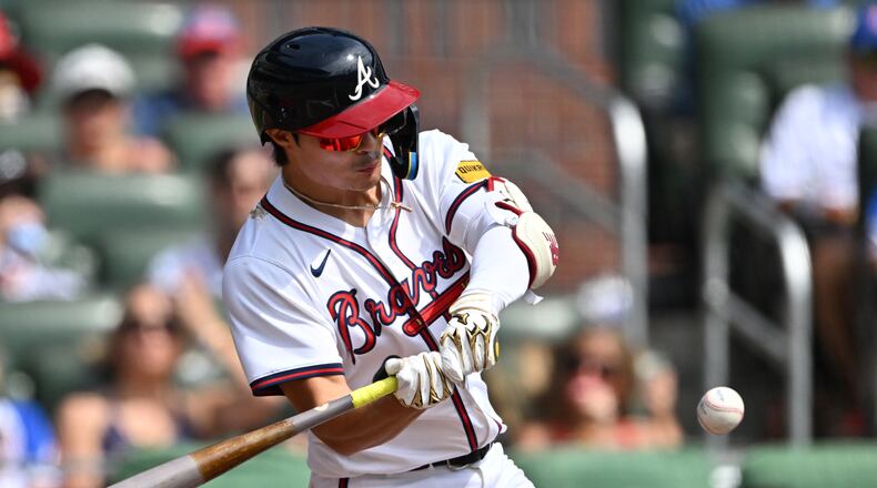 Atlanta Braves shortstop Ha-Seong Kim hits a single during the second inning of a baseball game at Truist Park, Wednesday, September 24, 2025, in Atlanta. (Hyosub Shin/AJC)