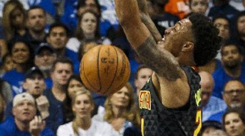 The Mavericks couldn't keep John Collins away from the rim. (Smiley N. Pool/Dallas Morning News/TNS)