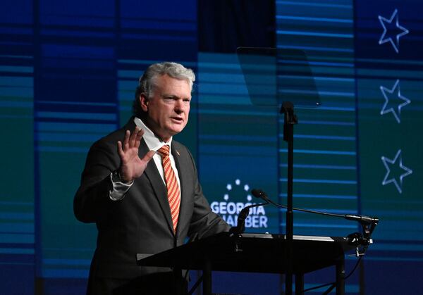 U.S. Rep. Mike Collins speaks during Wednesday’s Georgia Chamber congressional luncheon in Athens. (Hyosub Shin/AJC)