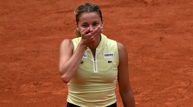 Poland's Maja Chwalinska reacts after winning the quarterfinal tennis match against Russia's Anna Kalinskaya at the French Open in Paris, Wednesday, June 3, 2026. (AP Photo/Emma Da Silva)