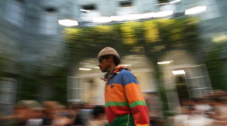 A model wears a creation as part of the Ralph Lauren Spring/Summer 2027 men's collection presented in Milan, Italy, Friday, June 19, 2026. (AP Photo/Antonio Calanni)