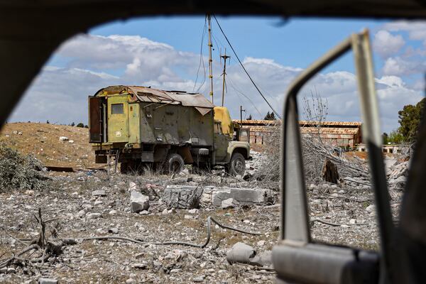 Debris is scattered at the site of an Israeli strike on a military airbase near Hama, Syria, Thursday, April 3, 2025. (AP Photo)