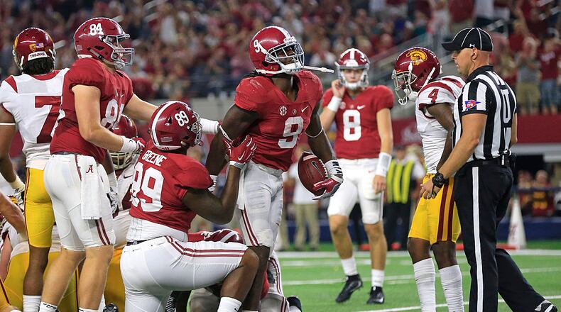 ARLINGTON, TX - SEPTEMBER 3: Bo Scarbrough #9 of the Alabama Crimson Tide walks through the end zone after scoring a touchdown against the USC Trojans in the second half during the AdvoCare Classic at AT&T Stadium on September 3, 2016 in Arlington, Texas. (Photo by Ron Jenkins/Getty Images)