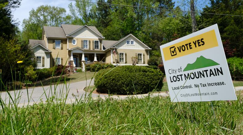 A political sign in favor of Lost Mountain cityhood is seen in Cobb County on Wednesday, April 20, 2022. (Arvin Temkar / arvin.temkar@ajc.com)
