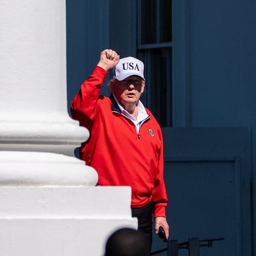 President Donald Trump pumps his fist as he arrives at the White House, Sunday, May 31, 2026, in Washington. (AP Photo/Alex Brandon)