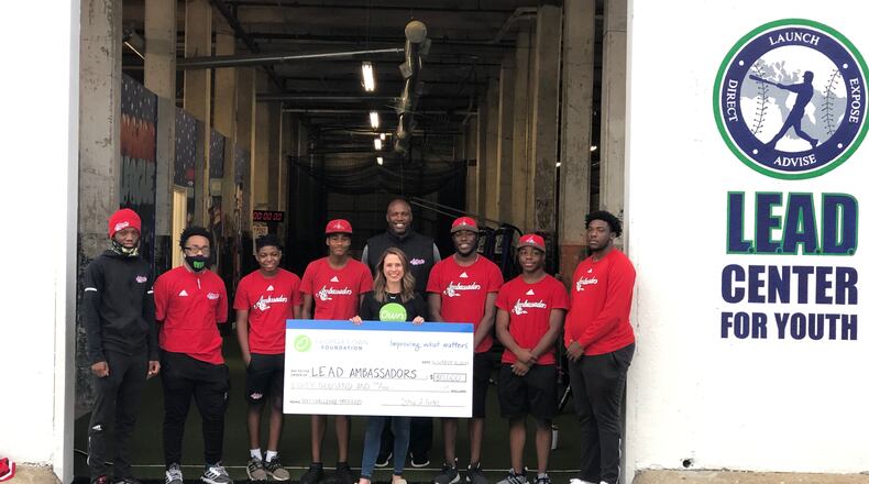 A group of L.E.A.D. ambassadors stand with co-founder C.J. Stewart and Marin Kraushaar, executive director of the Georgia's Own Foundation. Courtesy of L.E.A.D.