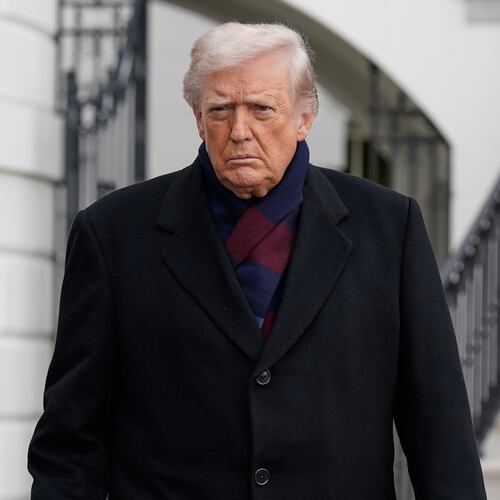 President Donald Trump talks to reporters as he departs from the South Lawn of the White House, Saturday, Dec. 13, 2025, in Washington, en route to Baltimore to attend the Army-Navy football game. (AP Photo/Jose Luis Magana)