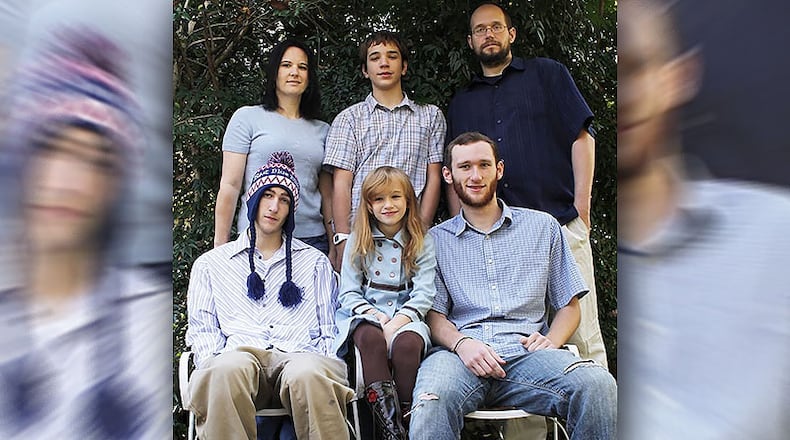 AnnaLisa Silliman-Patterson and Matt Lindsey with their children Josh (back between them) and then left to right Alex, SarahBeth, and Thomas.