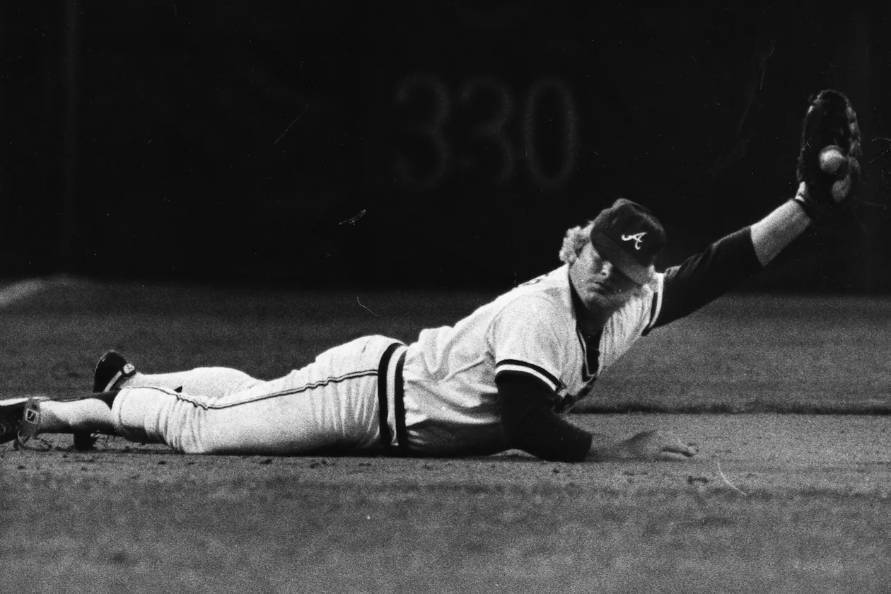 Bob Horner shows that he caught the ball on this play in 1981. Horner, who played with the Braves for nine years and won the 1978 Rookie of the Year award, died Tuesday at age 68. (Kenneth Walker/AJC 1981)
