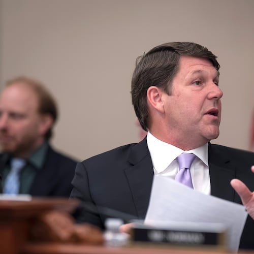 House Budget Committee Chairman Jodey Arrington, R-Texas, center, speaks with an aide during a markup on the Fiscal Year 2027 spending plan, at the Capitol in Washington, Thursday, July 16, 2026. (AP Photo/J. Scott Applewhite)