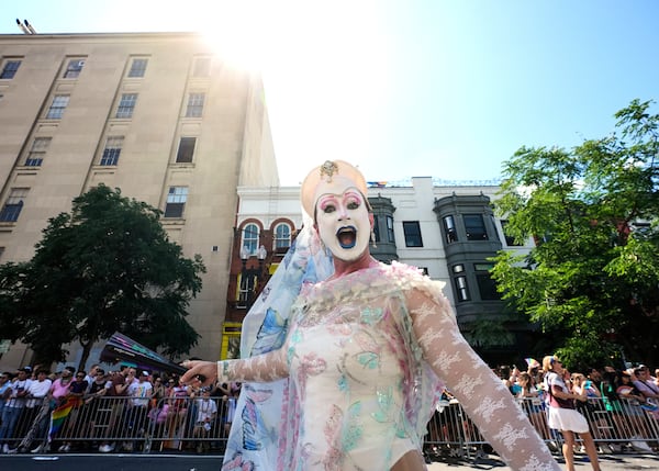 A person marches during the World Pride parade, Saturday, June 7, 2025, in Washington. (AP Photo/Alex Brandon)