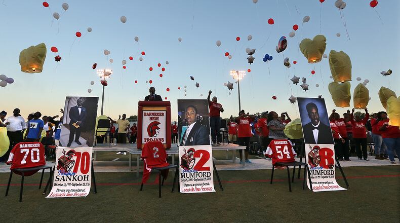 Members of the Mumford and Sankoh families release balloons on the field at the conclusion of the Ibrahim Sankoh, Jerrett Mumford and Jaylen Mumford Memorial Service and Balloon Release at Banneker High School for three teens killed in a car accident. Jerrett and Jaylen Mumford, 18 and 16 years old, and Ibrahim Sankoh, 18 years old, died after their car crashed about 8:15 p.m. on Sunday Sept. 25, near the intersection of Buffington and Royal South Parkway in Union City after attending homecoming activities. Curtis Compton /ccompton@ajc.com