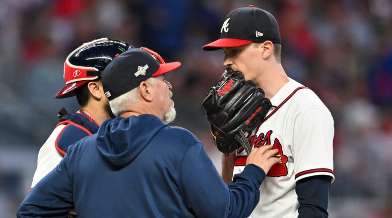 Atlanta Braves starting pitcher Max Fried (54) and Atlanta Braves pitching coach Rick Kranitz (39) talk during the fourth inning of NLDS Game 2 against the Philadelphia Phillies in Atlanta on Monday, Oct. 9, 2023. (Hyosub Shin / Hyosub.Shin@ajc.com)