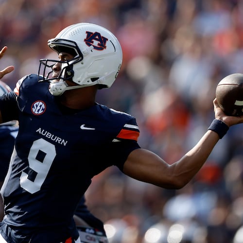 Auburn quarterback Deuce Knight (9) throws a pass during the first half of an NCAA college football game against Mercer, Saturday, Nov. 22, 2025, in Auburn, Ala. (AP Photo/Butch Dill)