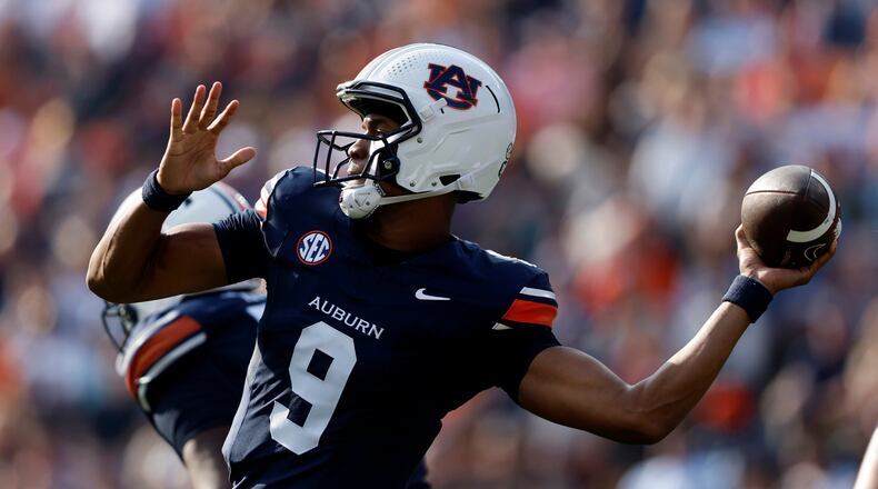 Auburn quarterback Deuce Knight (9) throws a pass during the first half of an NCAA college football game against Mercer, Saturday, Nov. 22, 2025, in Auburn, Ala. (AP Photo/Butch Dill)