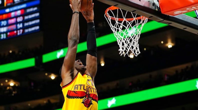 The Hawks' Onyeka Okongwu is trying to add more facets to his game ahead of his third season with the team. (AP Photo/John Bazemore)