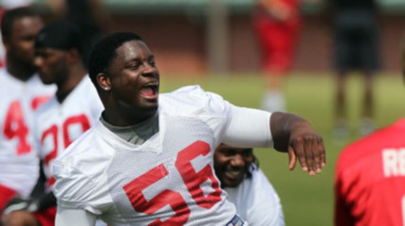 060612 FLOWERY BRANCH : Falcons linebacker Sean Weatherspoon fires up teammates during warmups for team practice at Flowery Branch on Wednesday, June 6, 2012. CURTIS COMPTON / CCOMPTON@AJC.COM Falcons linebacker Sean Weatherspoon . CURTIS COMPTON / CCOMPTON@AJC.COM