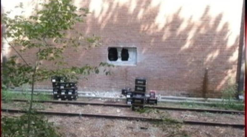 Thieves used drills and saws to cut through brick and concrete to get into this liquor distributor warehouse./CHANNEL 2 ACTION NEWS