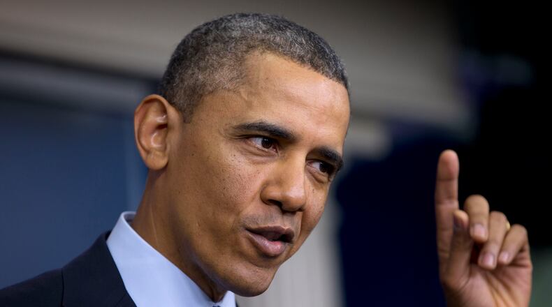 President Barack Obama gestures as he speaks to reporters in the White House briefing room in Washington, Friday, March 1, 2013, following a meeting with congressional leaders regarding the automatic spending cuts. (AP Photo/Carolyn Kaster)
