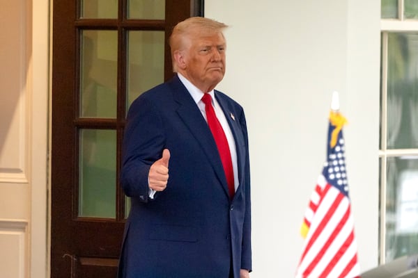 President Donald Trump gives a thumbs-up as Israel's Prime Minister Benjamin Netanyahu leaves the West Wing of the White House, Monday, April 7, 2025, in Washington. (AP Photo/Mark Schiefelbein)