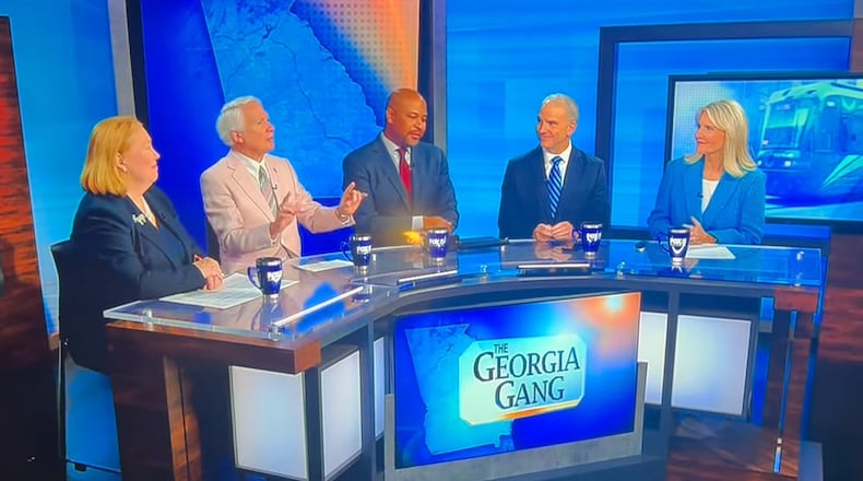 This screenshot shows the episode of Fox 5's “The Georgia Gang” that aired on Sunday, Aug. 23, 2026, after panelist Phil Kent (second from left) said free speech had limits and that a person shouldn't wear a T-shirt condoning violence like “Kill Tharon Johnson.” Johnson (center) reacted to that comment with a grimace, saying “Don't say that, Phil.” (Courtesy of Fox 5)