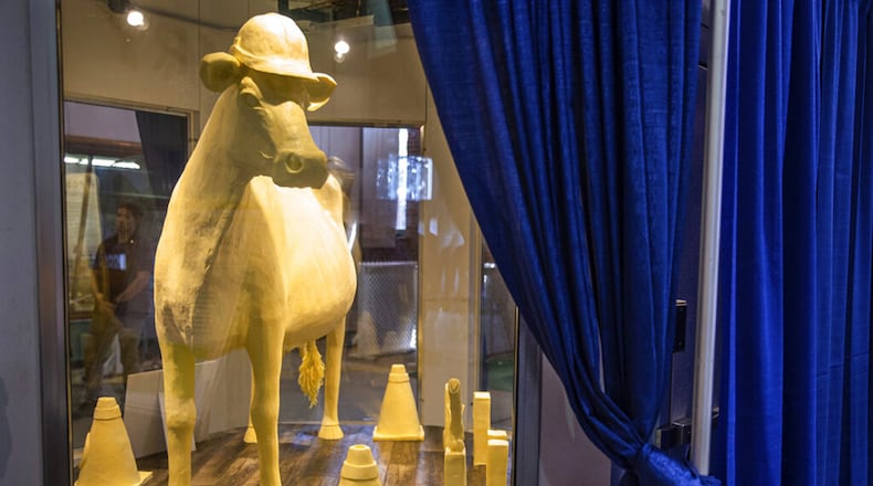 The 2019 Illinois State Fair Butter Cow is unveiled during a ceremony inside the Dairy Building on the Illinois State Fairgrounds on Aug. 7, 2019, in Springfield, Ill.