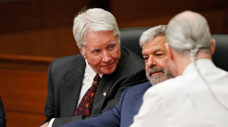 4/23/18 - Atlanta -  Tex McIver (left), defense attorneys Don Samuel and Bruce Harvey talk during court discussion on giving the jurors an Allen charge, encouraging a deadlocked jury to reach a verdict, after jurors in the Claud "Tex" McIver trial say they "don't see a path" to overcome their differences on the defendant's intent for all but one of the five counts, including malice murder. The jury resumed their fifth day of deliberations this morning during the Tex McIver murder trial at the Fulton County Courthouse.   Bob Andres bandres@ajc.com