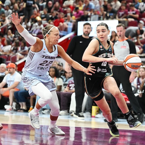 Toronto Tempo's Julie Allemand (22) defends against New York Liberty's Pauline Astier (18) during the second half of a WNBA basketball game in Montreal, on Sunday, July 12, 2026. (Graham Hughes/The Canadian Press via AP)