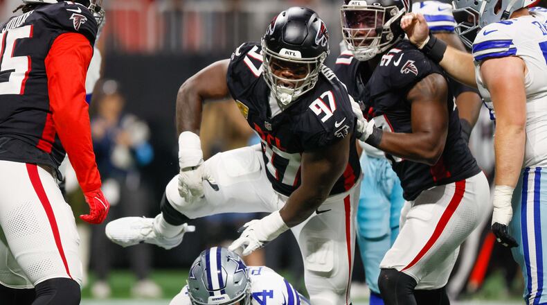 Atlanta Falcons defensive end Grady Jarrett (97) reactsafter sacking Dallas Cowboys quarterback Dak Prescott (4) during the first half of an NFL football game on Sunday, November 3, 2024, at Mercedes-Benz Stadium in Atlanta.
(Miguel Martinez/ AJC)