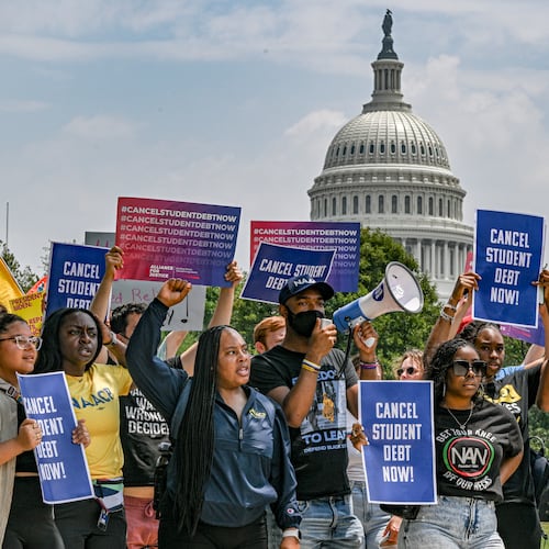 Demonstrators calling for the cancellation of student debt, in Washington, June 30, 2023. The Biden administration’s new income-driven repayment plan, SAVE, will reduce payments for millions of borrowers and more will qualify for $0 payments. (Kenny Holston/The New York Times)